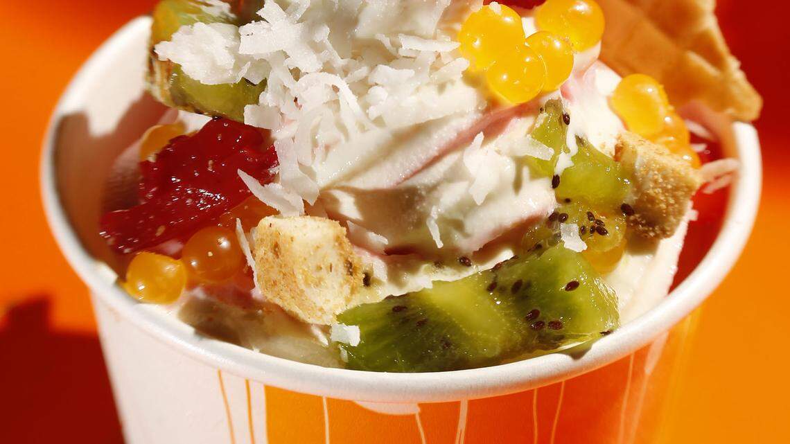 A freshly made frozen yogurt cup at the Orange Leaf on Tiverton Way. The self-serve chain has four stores in Lexington.