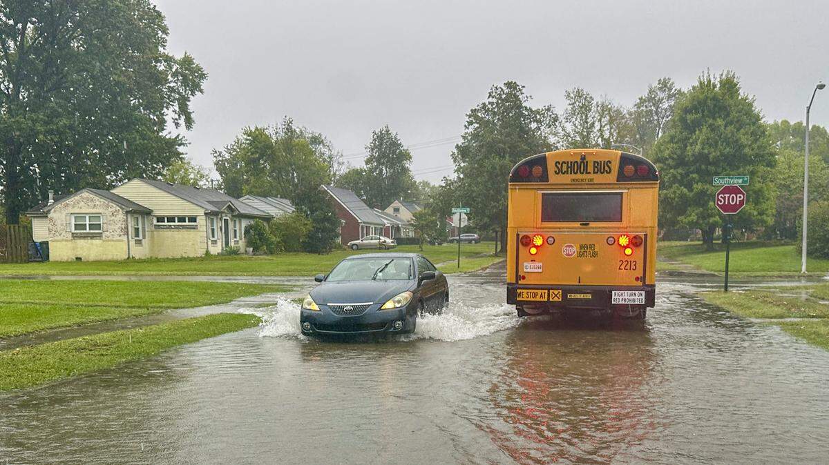 High waters flood the intersection of Southview and Sheridan drives after severe rains in Lexington, Ky., Tuesday, Oct. 7, 2025.