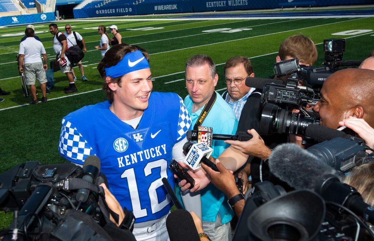 Sophomore quarterback Gunnar Hoak (12) answered questions from media members at Kroger field on Friday.