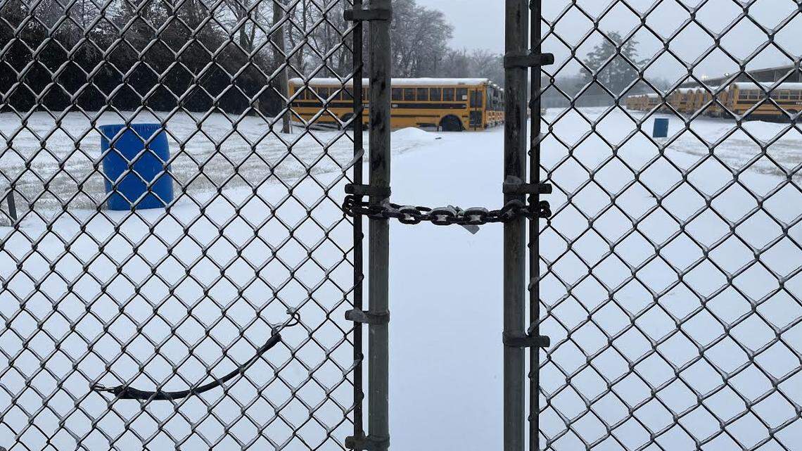 Fayette County Public Schools canceled remote learning and delayed the start of in-person learning for Tuesday Feb. 16, 2021 after ice and snow blanketed Lexington. The gates to the district bus facility on Liberty Road remained locked on Monday Feb. 15.