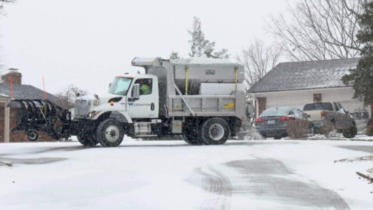 A salt truck worked on Gainesway Court in Lexington at 4 p.m. Jan. 24, 2026, as a major winter storm began to drop snow on Central Kentucky.