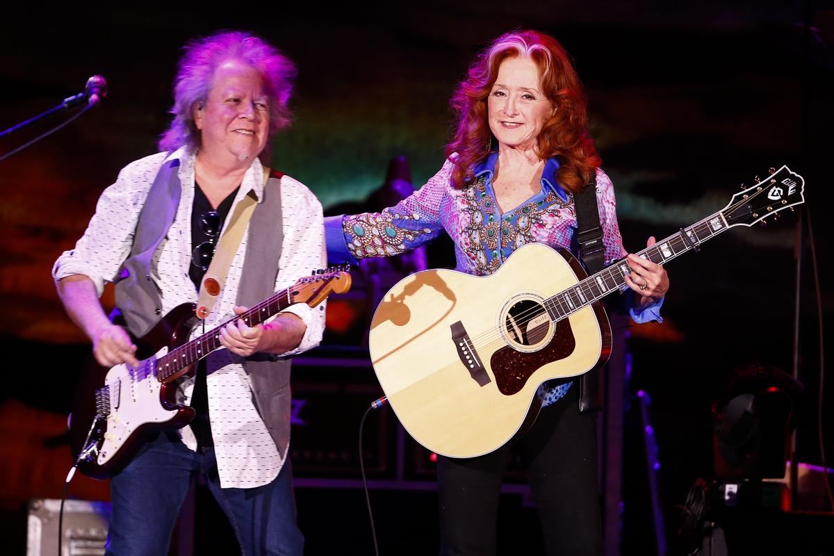 Bonnie Raitt laughed with guitarist George Marinelli during a performance Wednesday at Rupp Arena in Lexington.