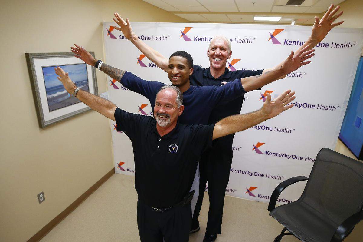NBA legend Bill Walton, rear, posed for a picture with Jim DeMasters, of Berea, and former UK basketball player Twany Beckham at the Women’s Hospital at Saint Joseph East in Lexington in 2017. The group was on hand to discuss overcoming injuries.