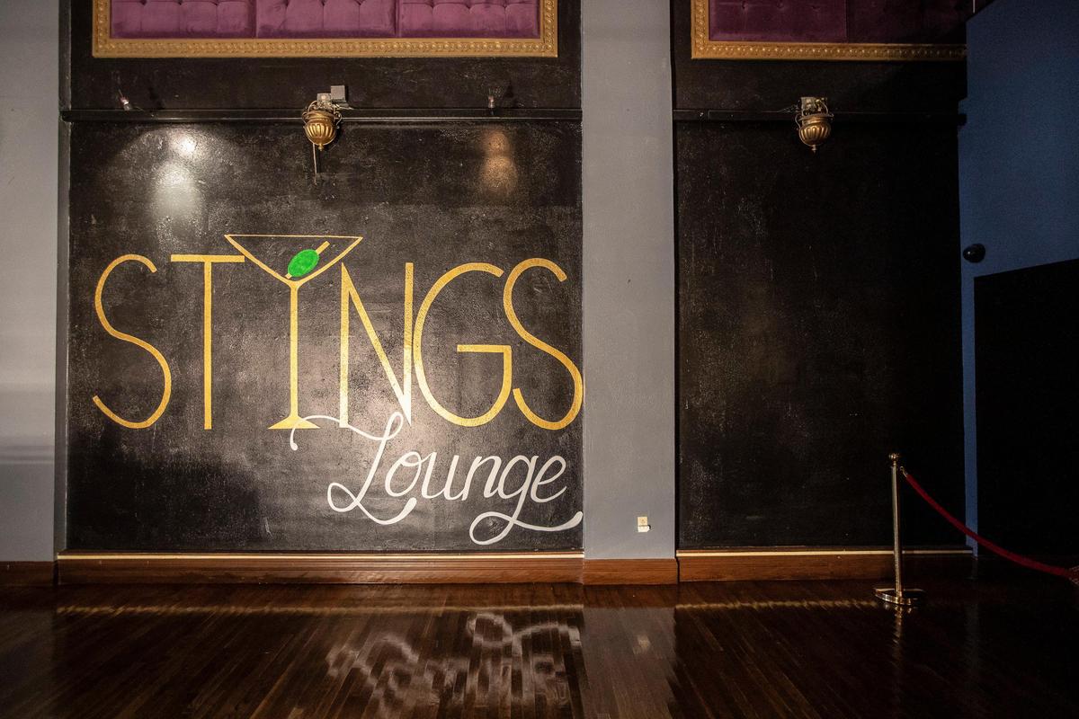 The logo on the wall at Stings Lounge was painted by the owner’s artist daughter, Chanaeya, who is 15.