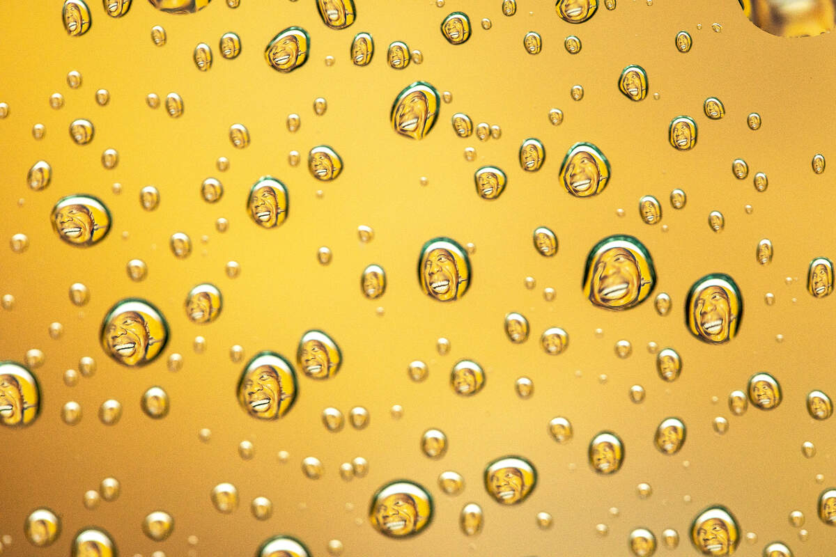 A mural of jazz great Louis Armstrong is reflected in raindrops Friday in Lexington. The mural, on the side of Lighthouse Ministries, 185 Elm Tree Lane, was created by Portuguese artist Sergio Odeith in 2015.