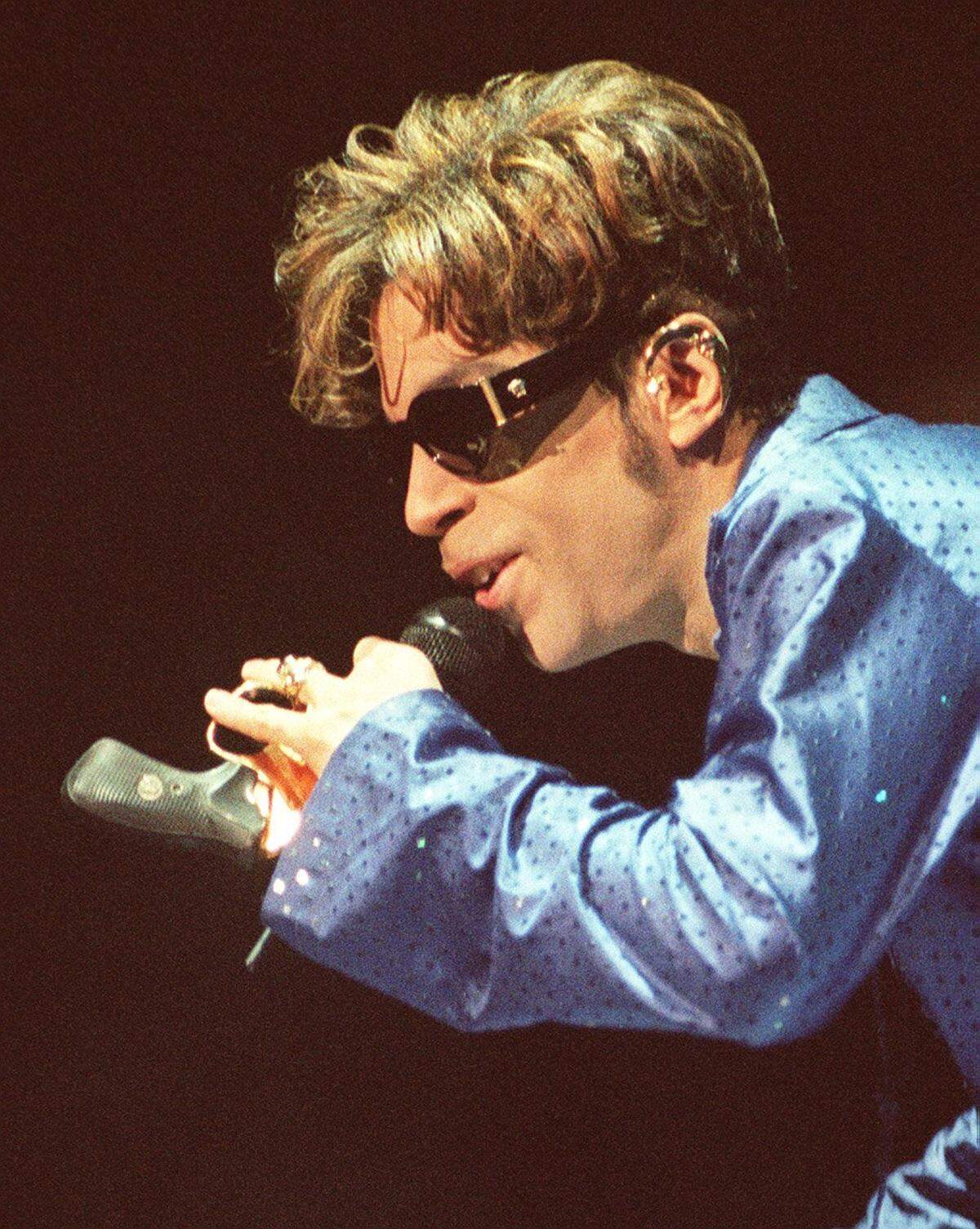 The Artist formerly known as Prince at his concert in Lexington, Ky. on November 5, 1997. Walter Tunis reviewed that concern, as well as one in 1984, then wrote an appreciation of Prince after his death in 2016.
