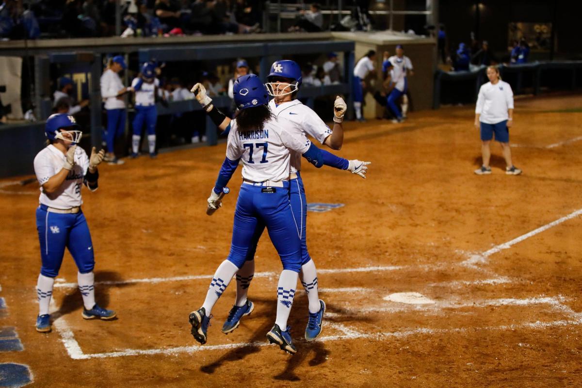 Kentucky’s Meeko Harrison (77) and Renee Abernathy (4) celebrate an Abernathy home run. The Wildcats finished sixth in the SEC with 73 home runs, led by 17 from Erin Coffel and 13 from Abernathy.