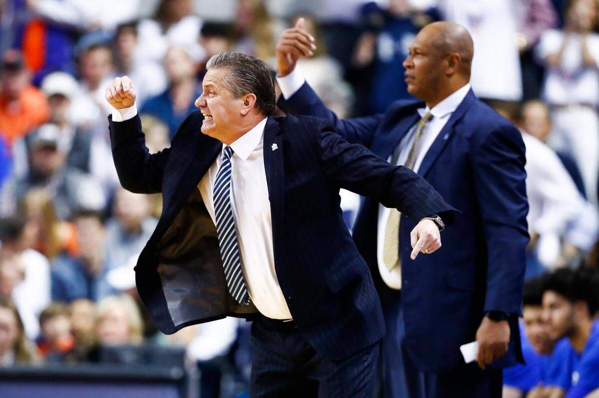Kenny Payne, right, teamed up with John Calipari, left, to produce four Final Four trips and a national championship at Kentucky in the past 10 years.