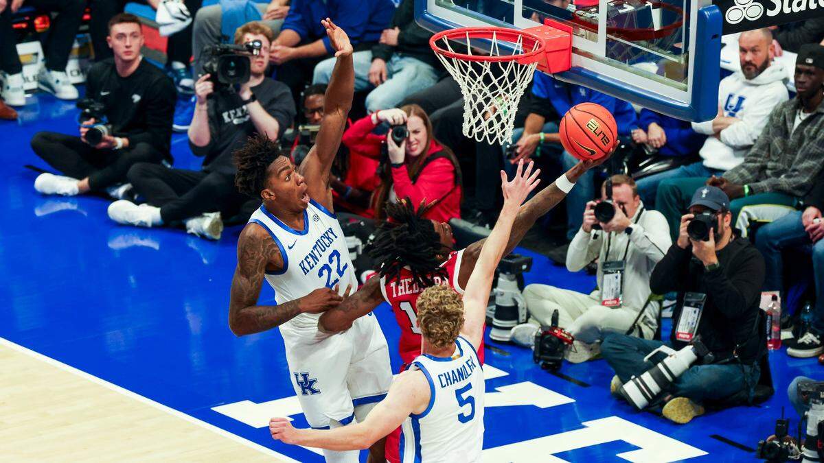 Western Kentucky freshman guard Julius Thedford (13) had a team-high 18 points when the Hilltoppers lost to Kentucky 87-68 at Rupp Arena on Nov. 26.