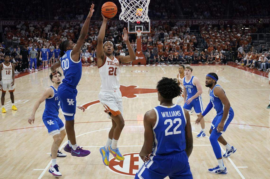 Tre Johnson puts up a shot in a victory over Kentucky last season. The Texas freshman is projected as a lottery pick in the 2025 NBA draft.