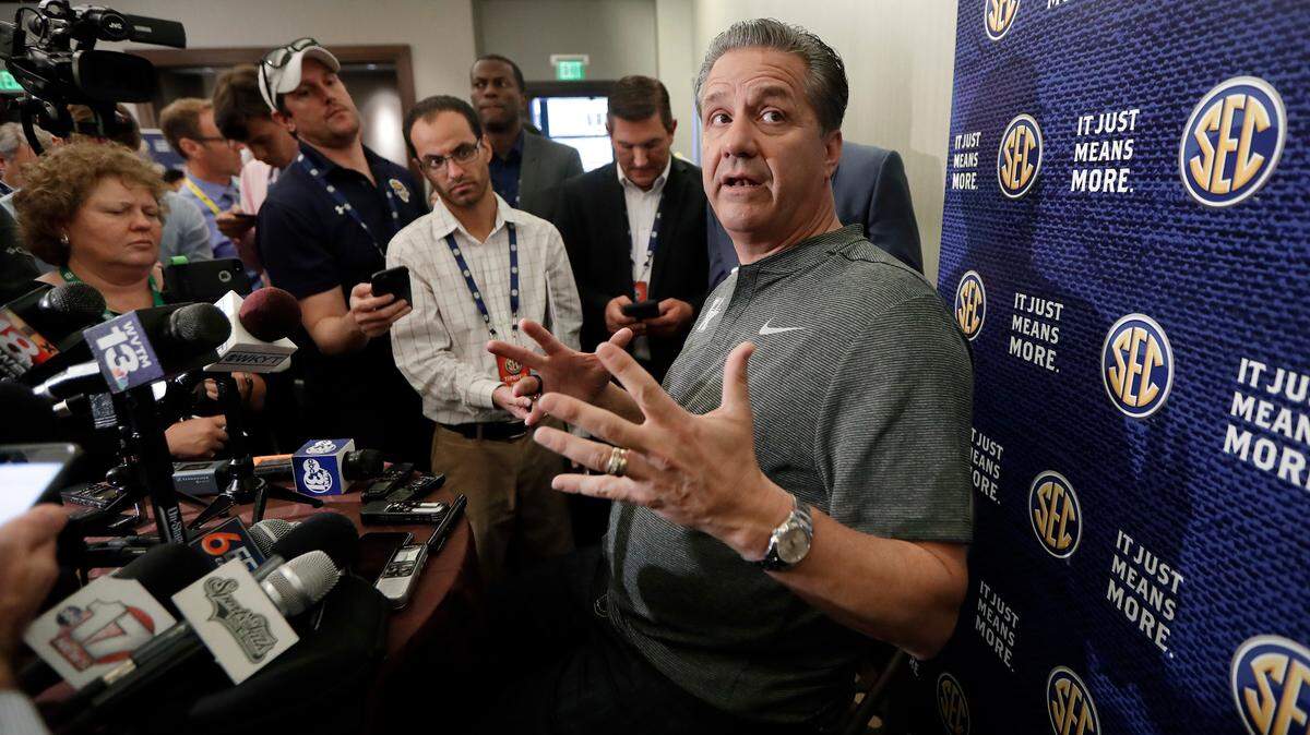 Kentucky ranks in the top 20 in the latest USA Today study of college sports revenue. UK head coach John Calipari is shown answering questions during the Southeastern Conference college basketball media day in Nashville last year.