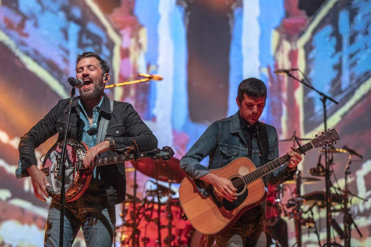 Scott Avett, left, and Seth Avett, of the Avett Brothers, perform during a Saturday concert at Rupp Arena.