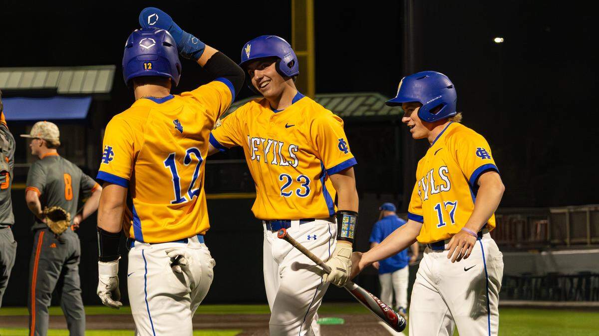 Henry Clay's Phearson Oepping, Henry Morgan, and Owen Thompson celebrate their home runs during Henry Clay's game against Frederick Douglass at Legends Field on April 15, 2026, in Lexington, Ky.