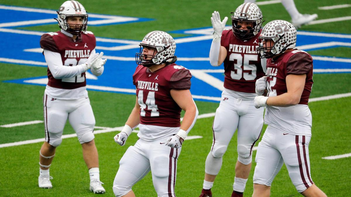 Pikeville’s Jeremiah Anderson (44) celebrates a first-half stop by the Panthers’ defense, which limited Raceland to 177 total yards Friday.