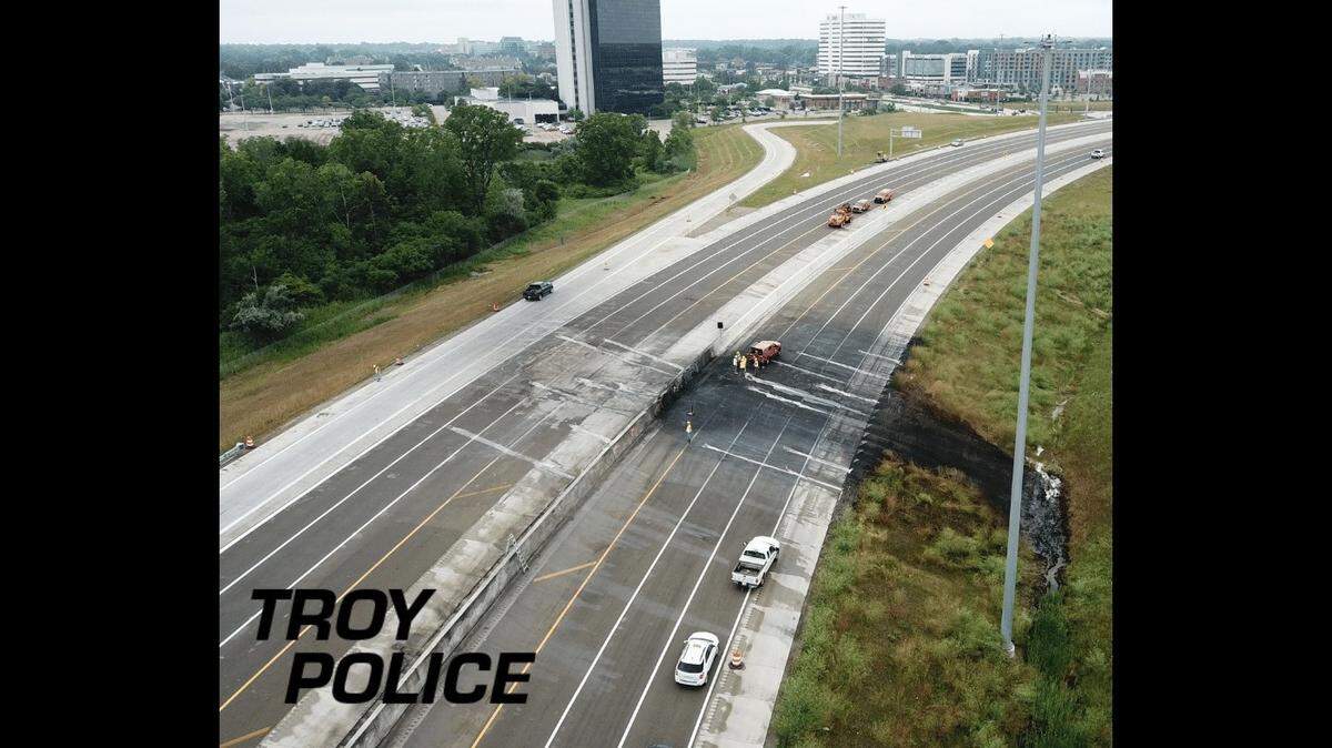 Fire damaged pavement across all travel lanes and spread down the shoulder of the interstate.