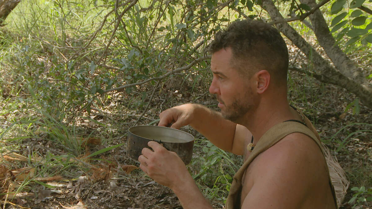Lexington’s Andrew Shayde, shown drinking water, is on the new season of Discovery Channel’s “Naked and Afraid.”