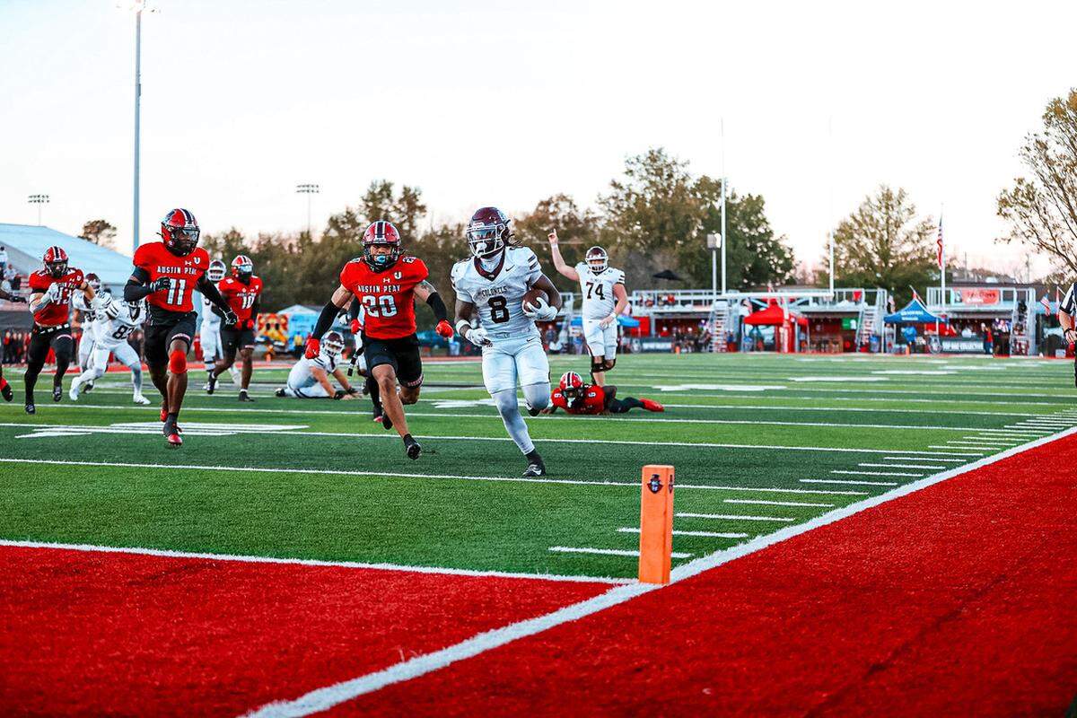 EKU running back Joshua Carter runs for a game-winning touchdown in overtime against Austin Peay in Clarksville, Tennessee, last Saturday.