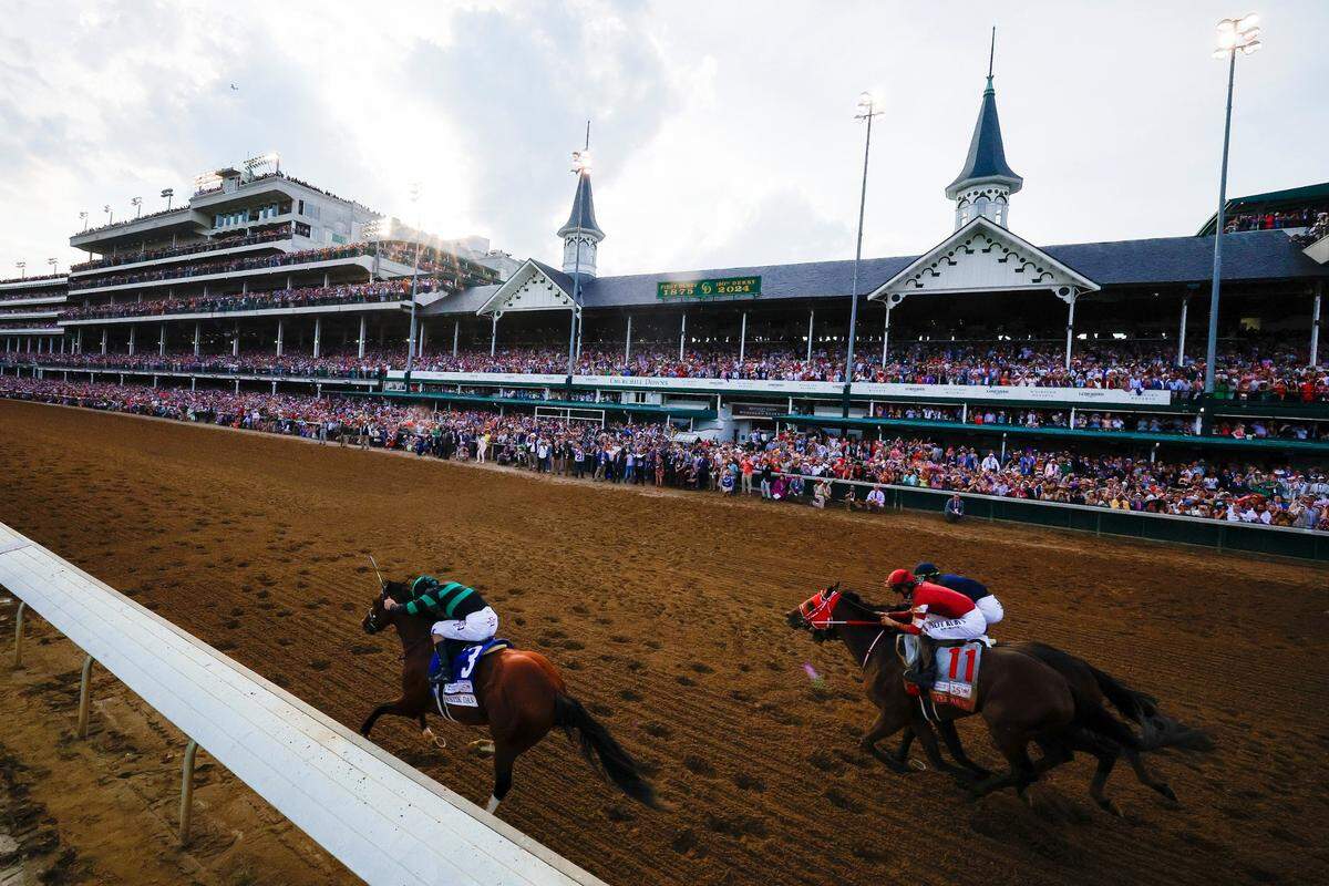 Brian Hernandez Jr. guides Mystik Dan (3) just before winning the 150th running of the Kentucky Derby at Churchill Downs.