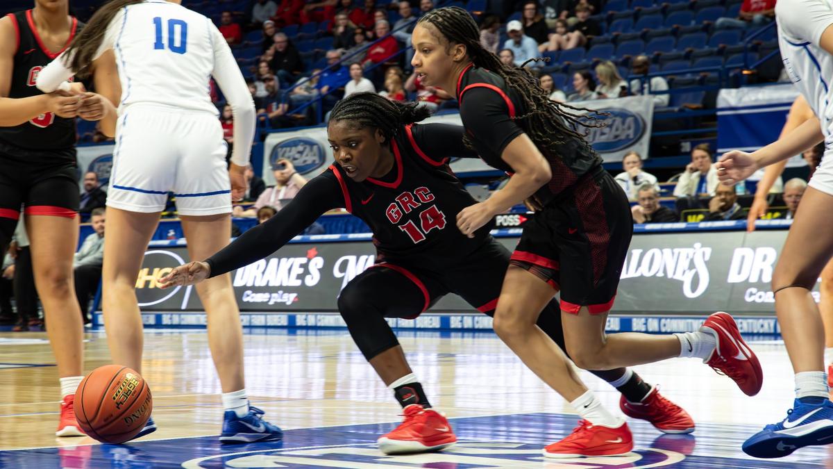 George Rogers Clark’s Khania Jones (14) pursues a loose ball during the Cardinals’ Sweet 16 quarterfinal win over North Laurel on Friday. Jones finished with six points, four rebounds, three steals and two blocked shots.
