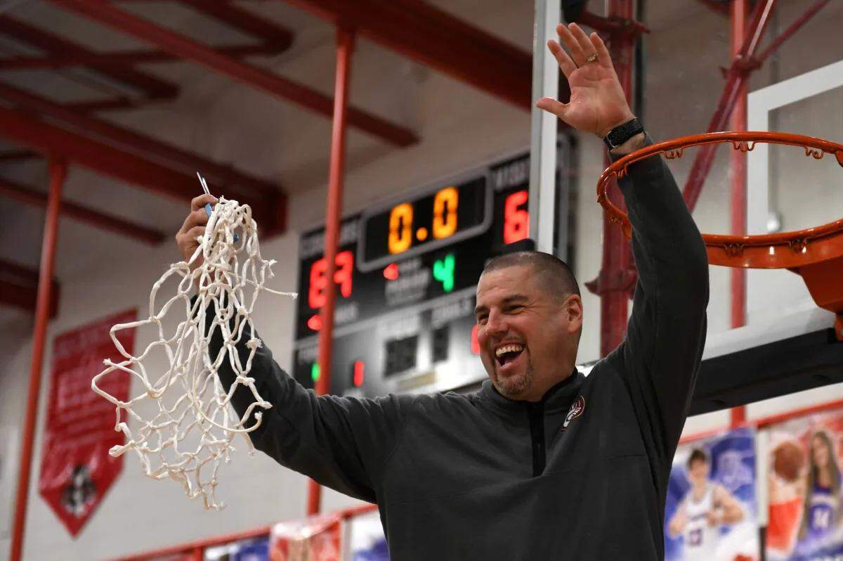 Tim Sullivan celebrated after his team won the 33rd District Tournament this season. The longtime Cooper High School coach might not be back next season, a decision that might not be his own.