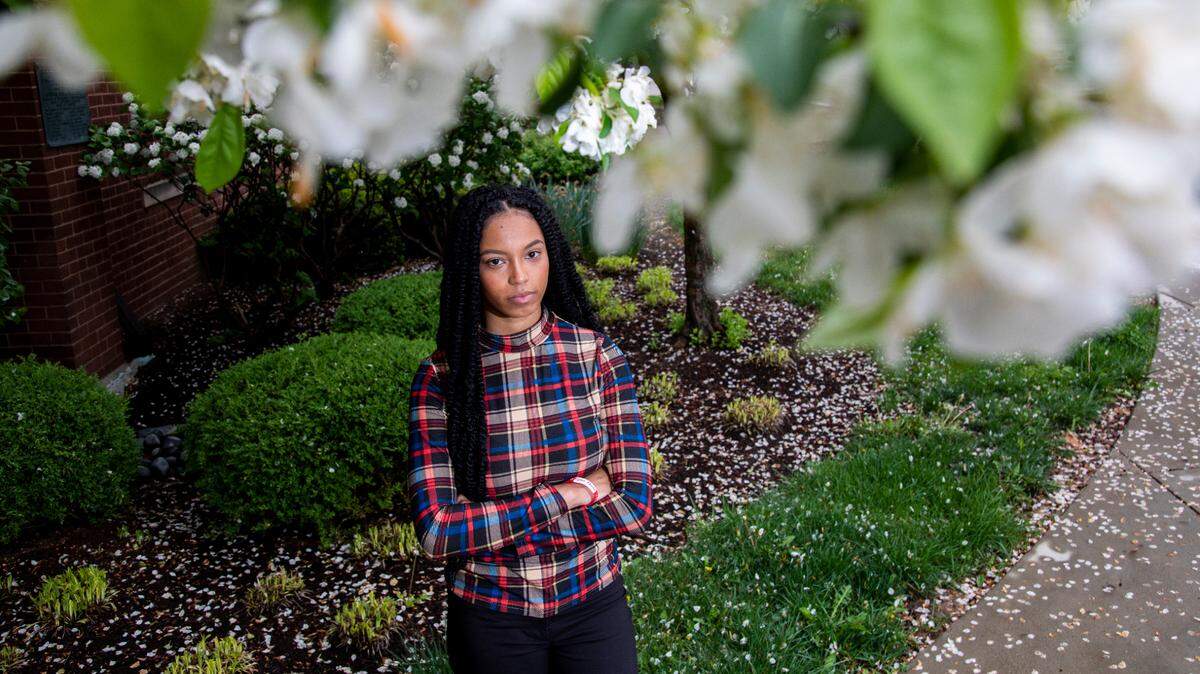 Keyera Jackson poses for a portrait outside the Gatton Center at the University of Kentucky in Lexington, Ky., Wednesday, April 13, 2021.