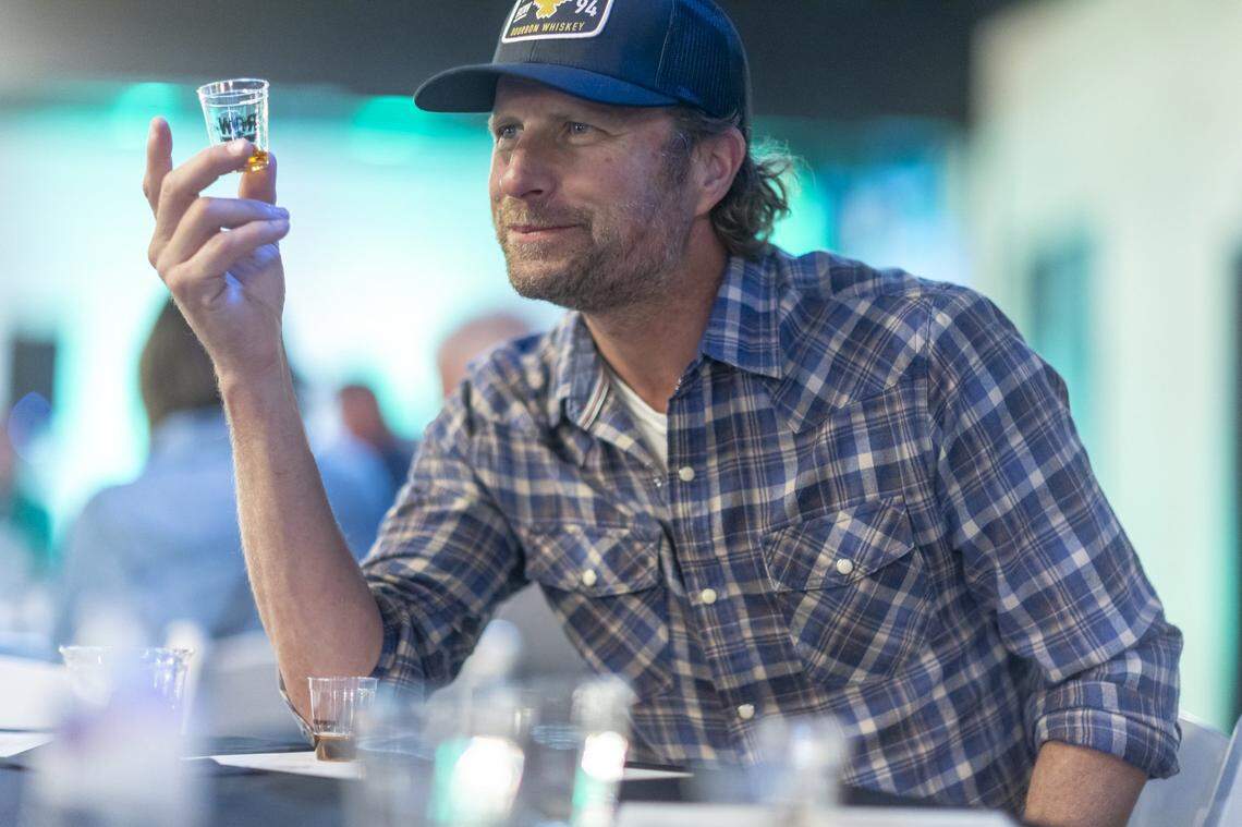 Country musician Dierks Bentley tries a taste of his Row 94 Full Proof bourbon during a release event at Green River Distillery in Owensboro, Ky., on Wednesday, Sept. 24, 2025.
