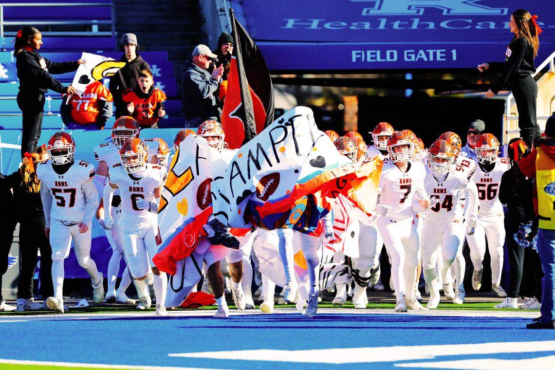 The Raceland Rams take the field during the 2024 Class A UK HealthCare Sports Medicine State Football Finals state championship game against Sayre at Kroger Field on Dec. 6, 2024. Raceland returns to Lexington to face Kentucky Country Day in this year’s championship game.