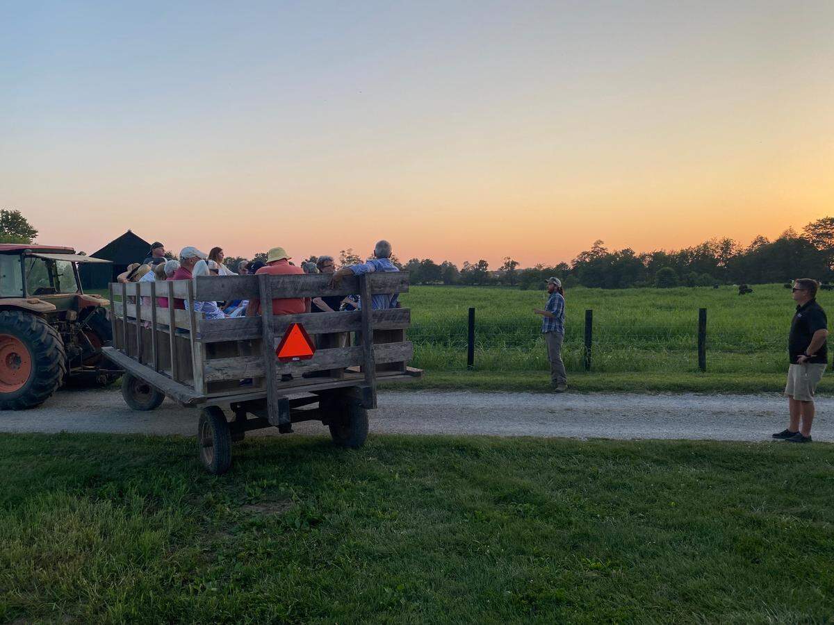 Dylan Kennedy, a Kentucky farmer and field lead for a Mt. Folly Farm USDA grant, teaches a farm tour about rotational grazing at Clark County’s Mt. Folly Farm.