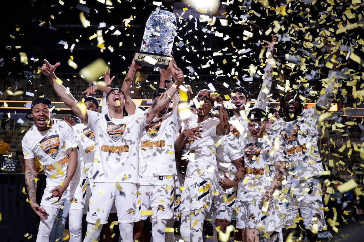 Northern Kentucky celebrated with the trophy after its win against Illinois Chicago in the Horizon League Tournament championship game.