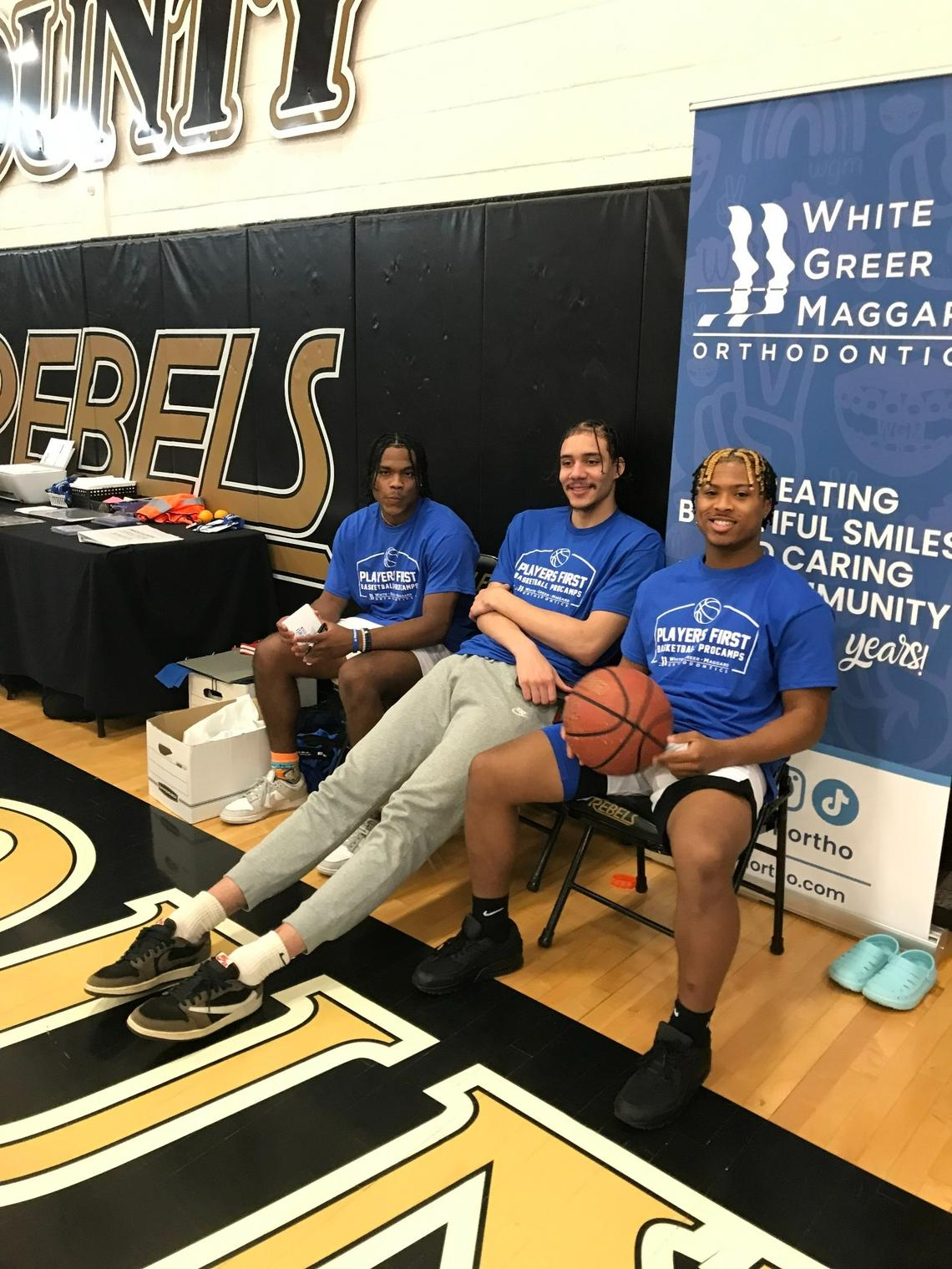 University of Kentucky basketball players Sahvir Wheeler, left, and Lance Ware, center, worked a youth basketball camp at Boyle County High School in Danville on Thursday with Jarvis Byrd, right. Byrd is the son of former UK player Leroy Bird.