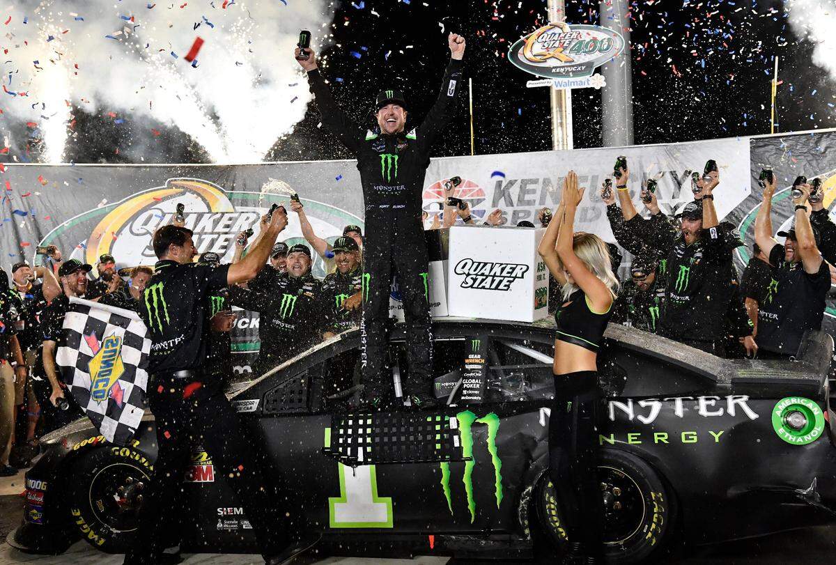 Kurt Busch celebrated his win in the Quaker State 400 Presented by Wal-Mart on Saturday night at Kentucky Speedway. It was his 31st career Cup victory.