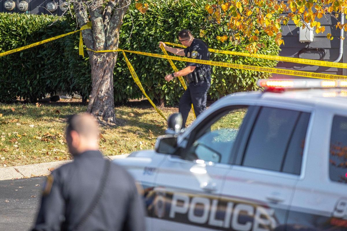 Members of the Lexington Police Department respond to the report of a shooting in an apartment complex along North Locust Hill Drive in Lexington, Ky., on Friday, Oct. 28, 2022.