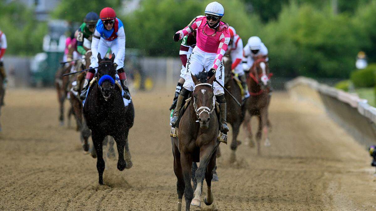 Flavien Prat atop Rombauer, center, celebrated after their win in the Preakness Stakes on Saturday. Prat’s victory came two years after being elevated to the Kentucky Derby winner aboard Country House when Maximum Security was disqualified. “Of course it’s a lot different when you cross the wire first: You get that feeling,” Prat said. “It’s a lot of joy.”