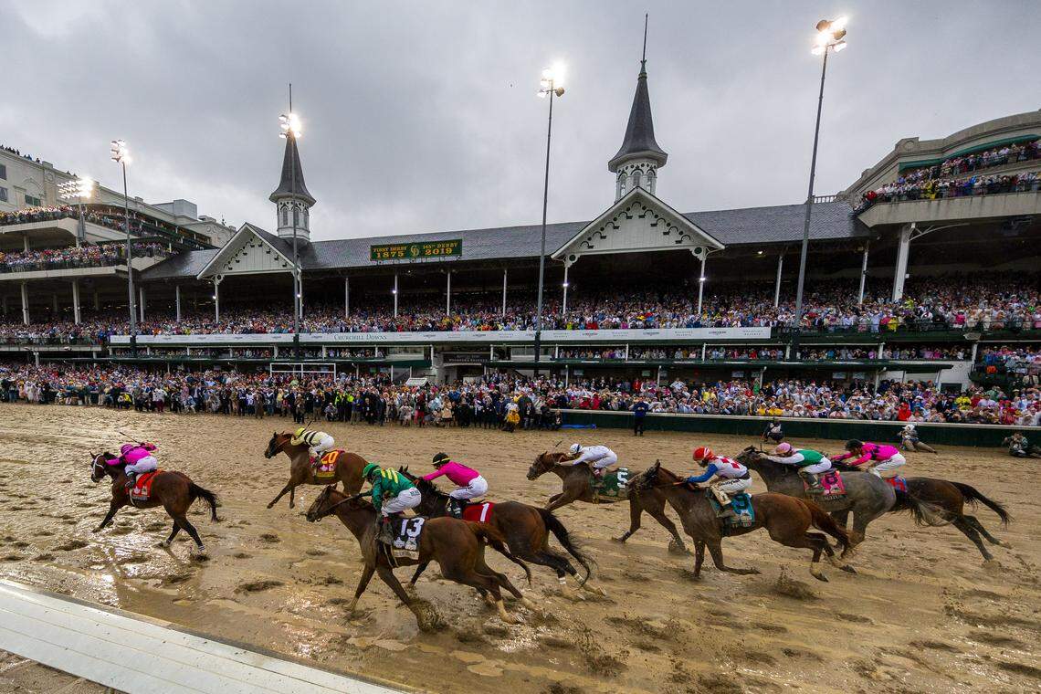 Maximum Security (7) with Luis Saez up, and Country House (20) with Flavien Prat up, down the final stretch in the 145th running of the Kentucky Derby at Churchill Downs in Louisville, Ky., Saturday, May 4, 2019.
