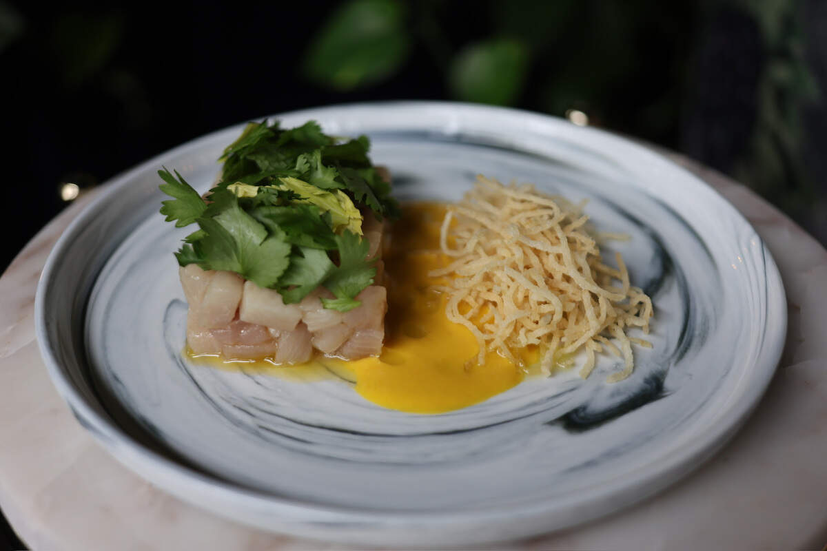 Hamachi Crudo is a new first course item for Summer 2026 at Mileta. Sashimi-grade yellowtail is accompanied with spicy aji amarillo vinaigrette, makrut lime, and crispy potato sticks.