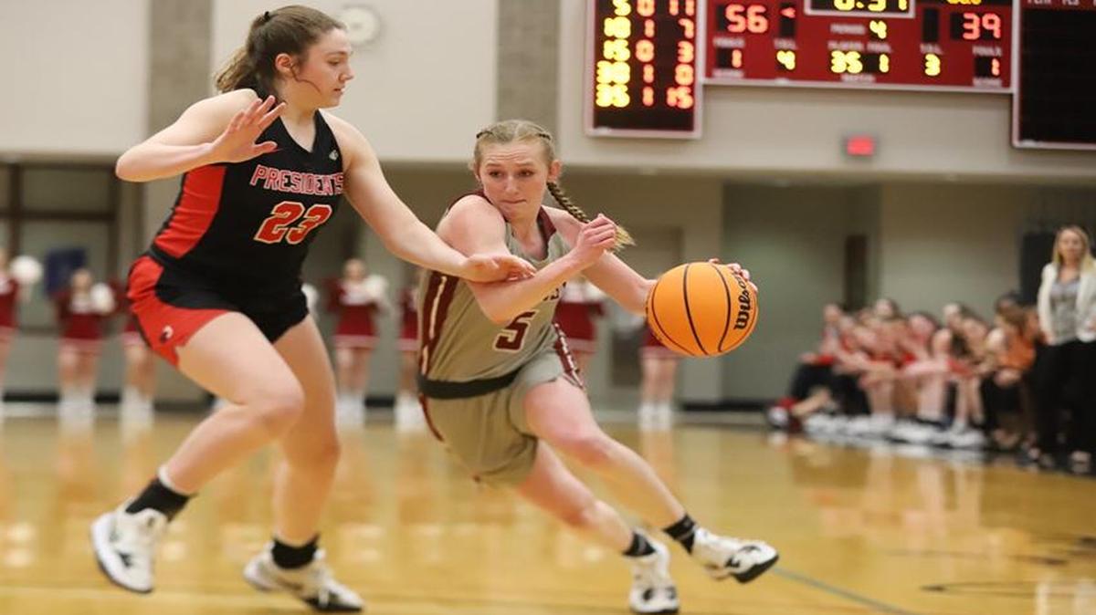 Transylvania’s Madison Kellione drives against Washington and Jefferson’s Meghan Dryburgh during Friday’s Pioneers win in the opening round of the Division III Tournament in Lexington. Kellione led Transy with 20 points.