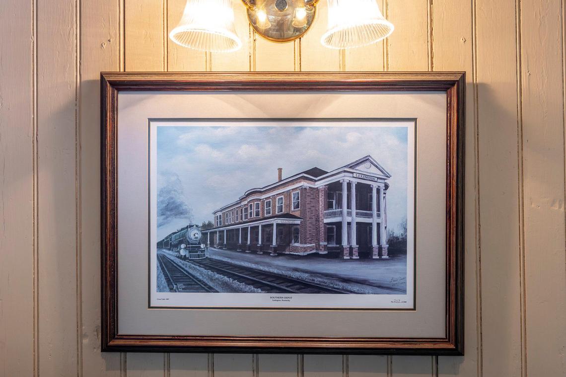 Lois Todd’s print, “Southern Depot,” of Lexington’s Southern Depot, is on display at Nostalgia Station Toy Museum in Versailles, Ky., on Friday, Jan. 3, 2025.