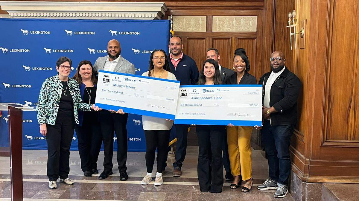 Michelle Moore, left, and Aline Sandoval Cano pose for a photo after being named the recipients of the 2024 “Be the Change” scholarships.