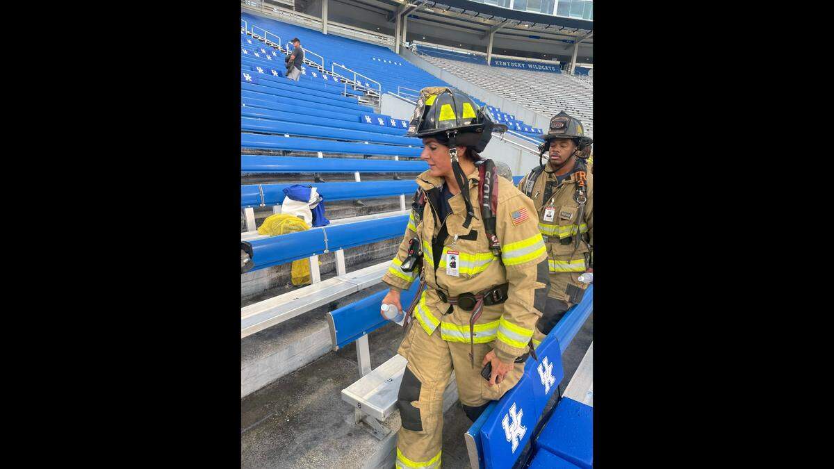 Ana Ruzevic, a firefighter from Birmingham, Alabama, wears full turnout gear as she begins the stair climb.