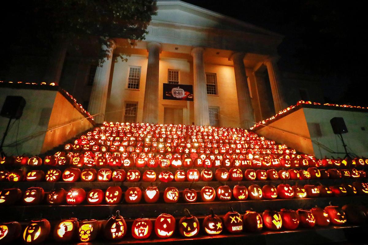 About 650  jack-o’-lanterns sit on display during PumpkinMania on the steps of the Old Morrison building at Transylvania University in Lexington, Ky., Tuesday, Oct, 29, 2019. The jack-o’-lanterns were carved by Transylvania students, faculty and various elementary school students from Lexington.