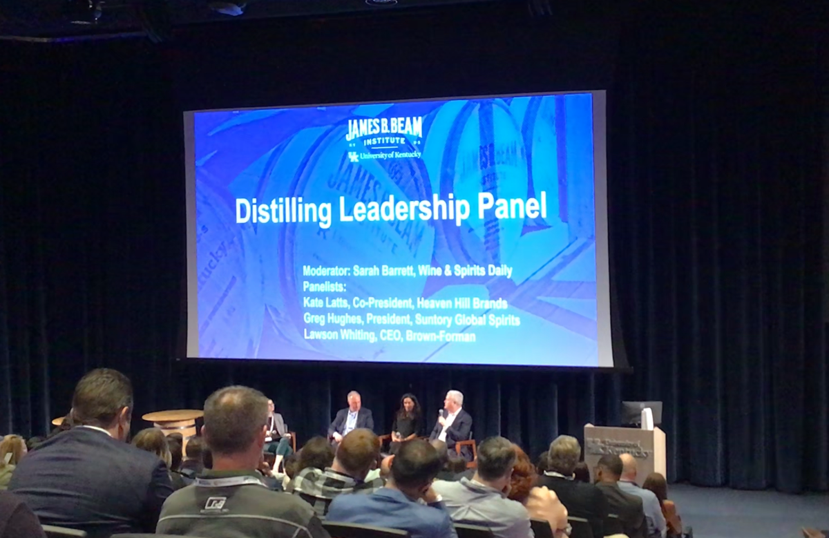 Bourbon leaders Greg Hughes of Suntory Global Spirits, Kate Latts of Heaven Hill and Lawson Whiting of Brown-Forman speak on the state of the distilling industry at the James B. Beam Institute annual conference at the University of Kentucky.