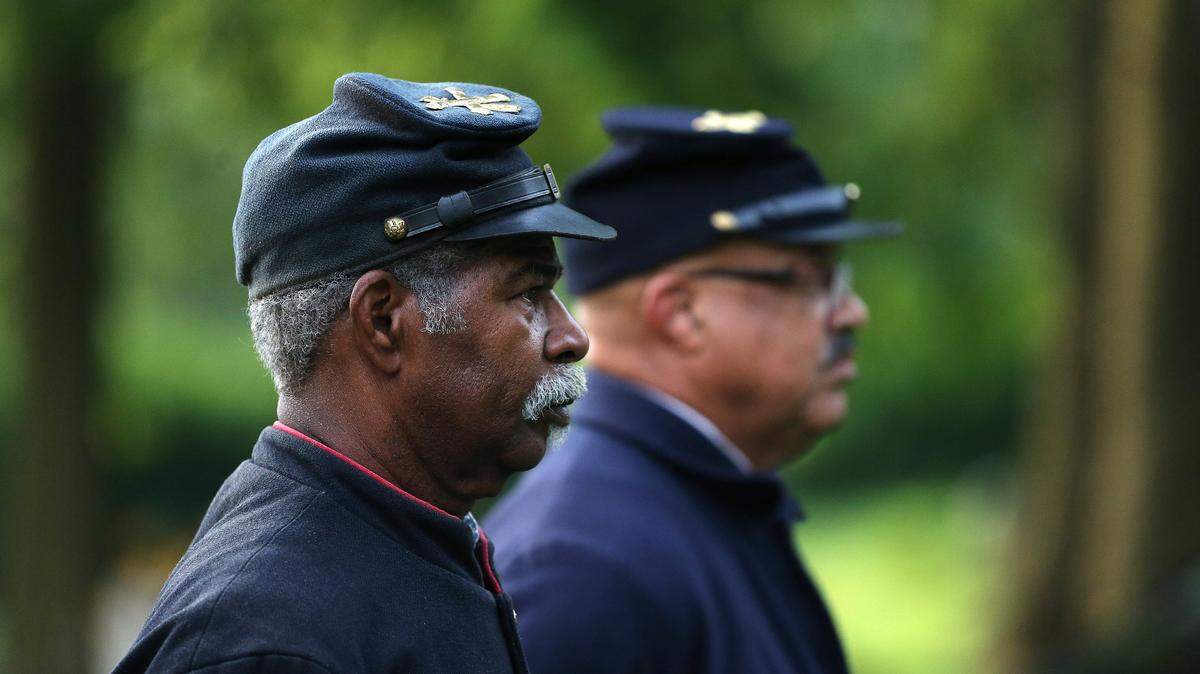 Robert Bell takes part in a Juneteenth Jubilee at African Cemetery No. 2 on Seventh Street in Lexington in this file photo from 2019.