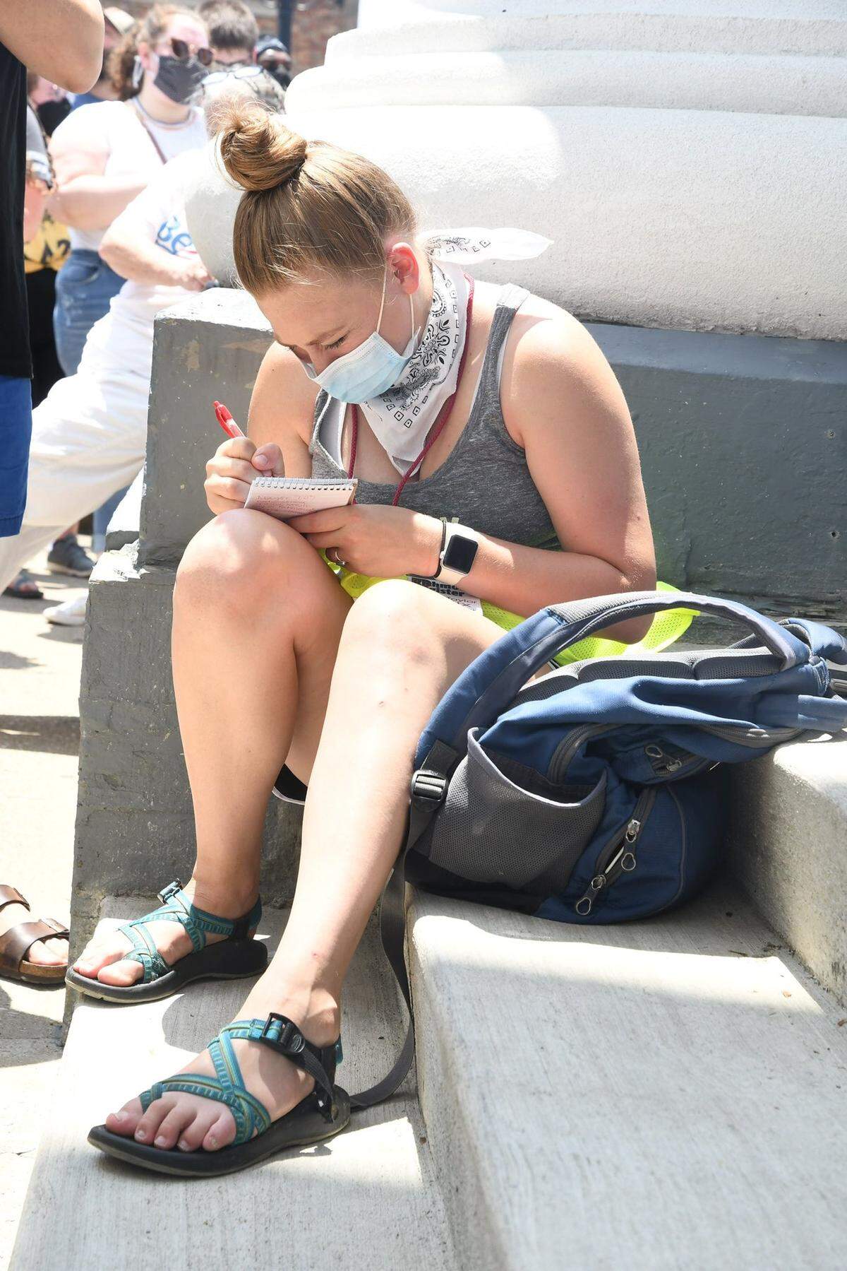 Herald-Leader reporter Taylor Six reports during a Black Lives Matter protest in Richmond, KY, in July 2020.