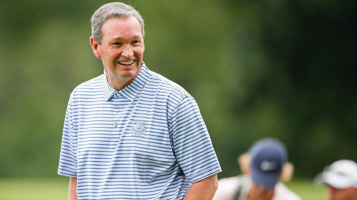 Kentucky Director of Athletics Mitch Barnhart joked with another player during the PGA Barbasol Championship Pro-Am at Keene Trace Golf Club in Nicholasville on July 14.