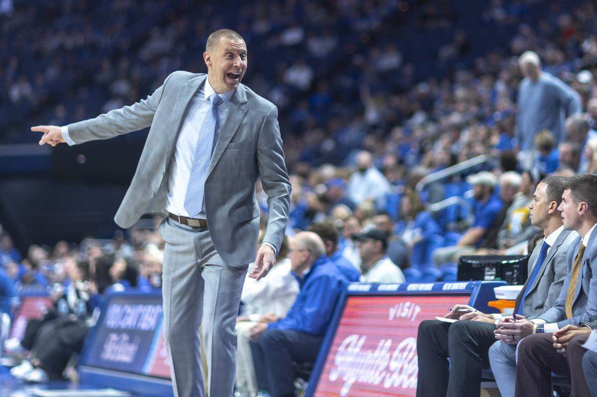 Kentucky head coach Mark Pope talks to his players during Friday’s game against Eastern Illinois at Rupp Arena.
