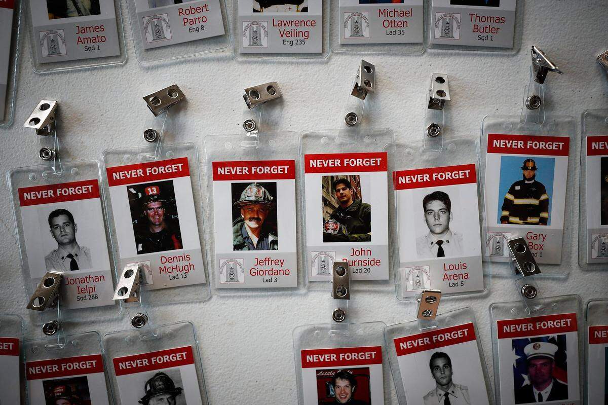 Badges of firefighters and police officers lost in the attack 20 years ago were worn Thursday by those who climbed the Kroger Field bleachers in their honor.