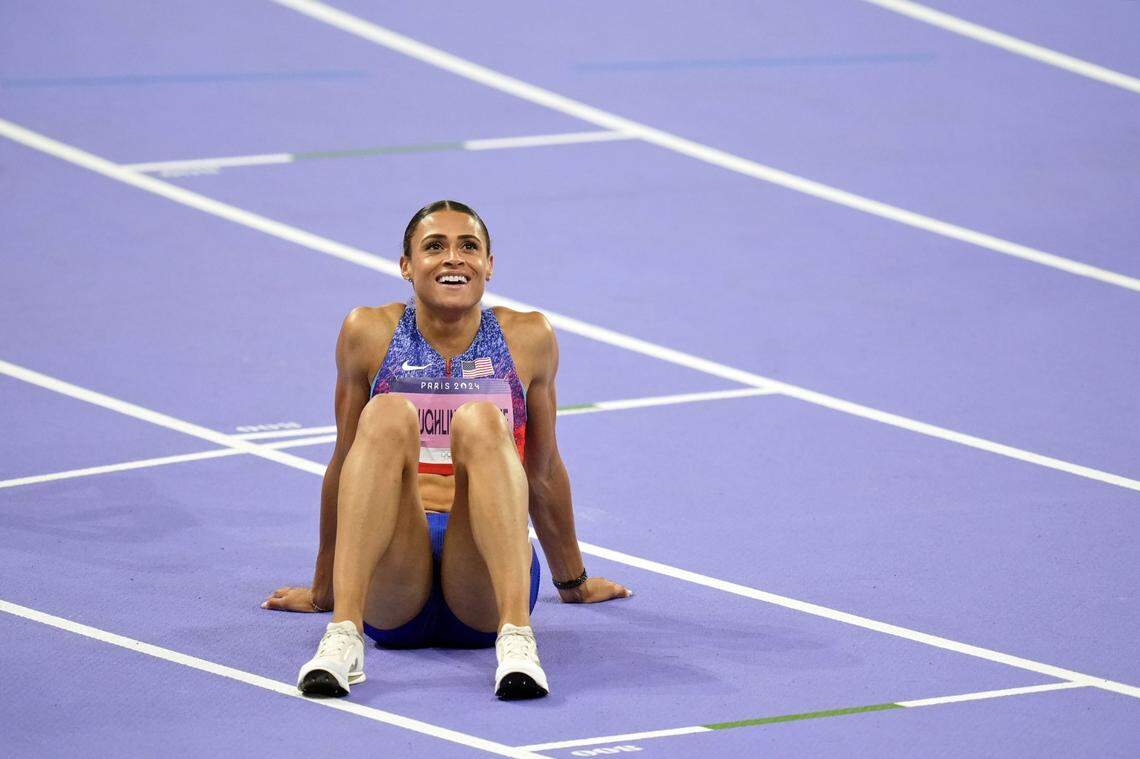 Aug 8, 2024; Paris Saint-Denis, France; Sydney McLaughlin-Levrone (USA) reacts after winning the women's 400m hurdle final during the Paris 2024 Olympic Summer Games at Stade de France. Mandatory Credit: Andrew Nelles-USA TODAY Sports