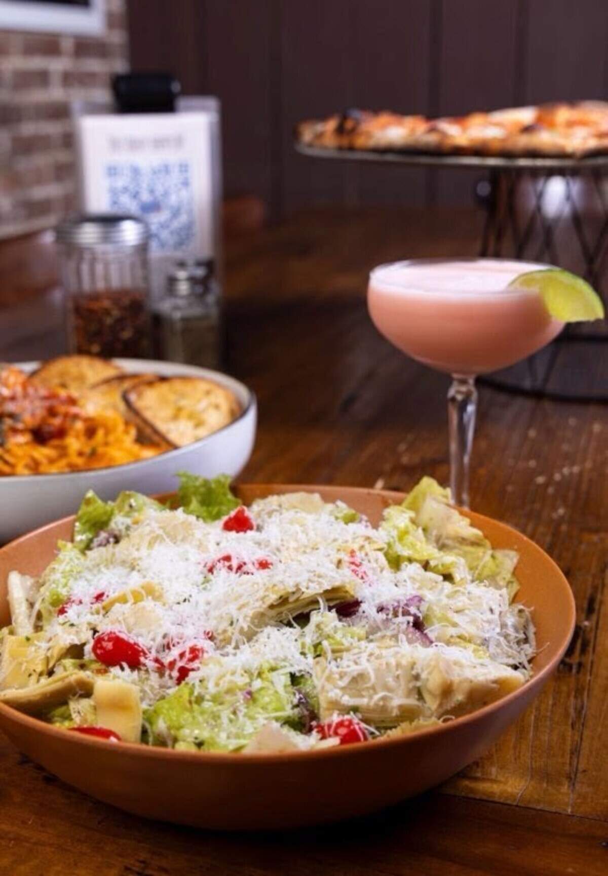 Deluca’s Pizza is known for its Italian “soaked” salads as well as its pizza and burgers. The Lexington restaurant also will have a full bar with cocktails.