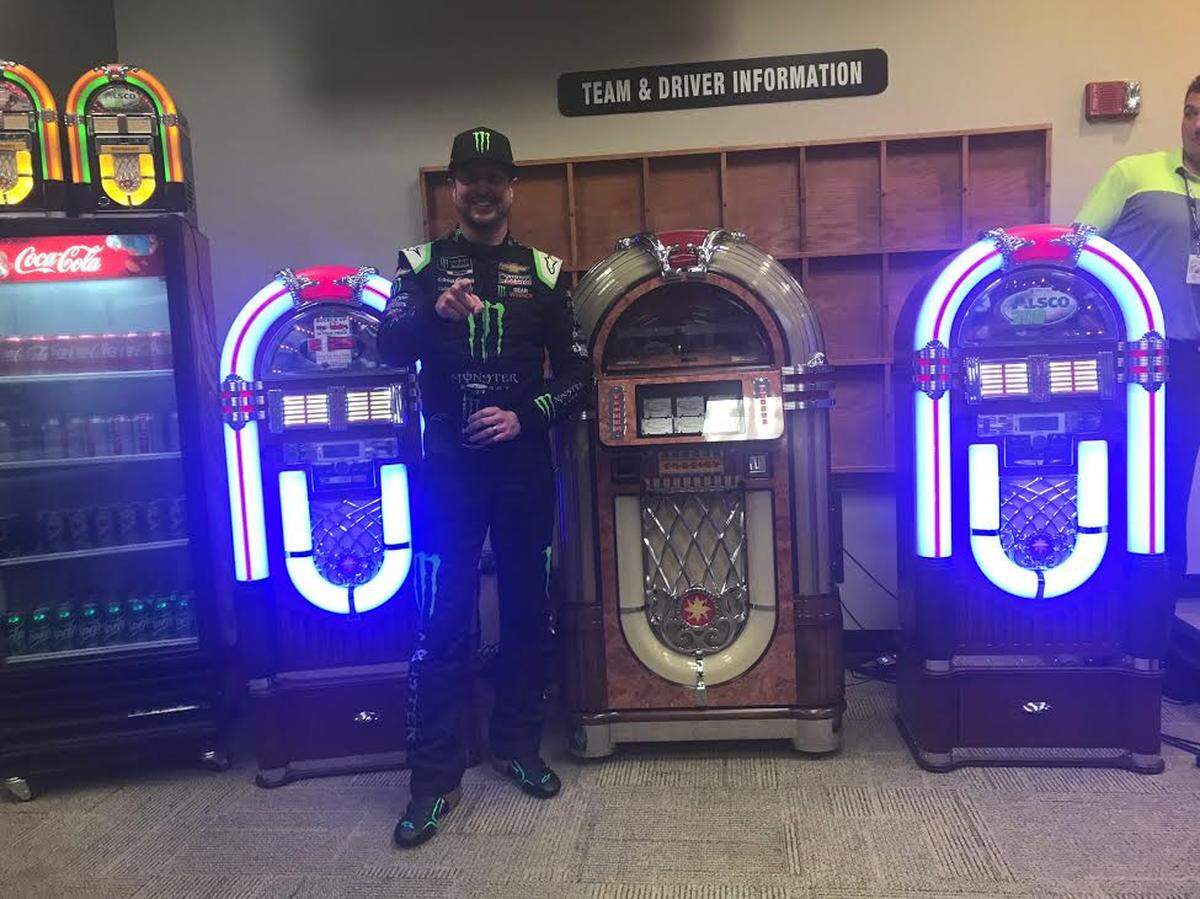 Kurt Busch stood in front of the Crosley Slimline jukebox (retail: $8,995.95) he earned by winning the Quaker State 400 at Kentucky Speedway.