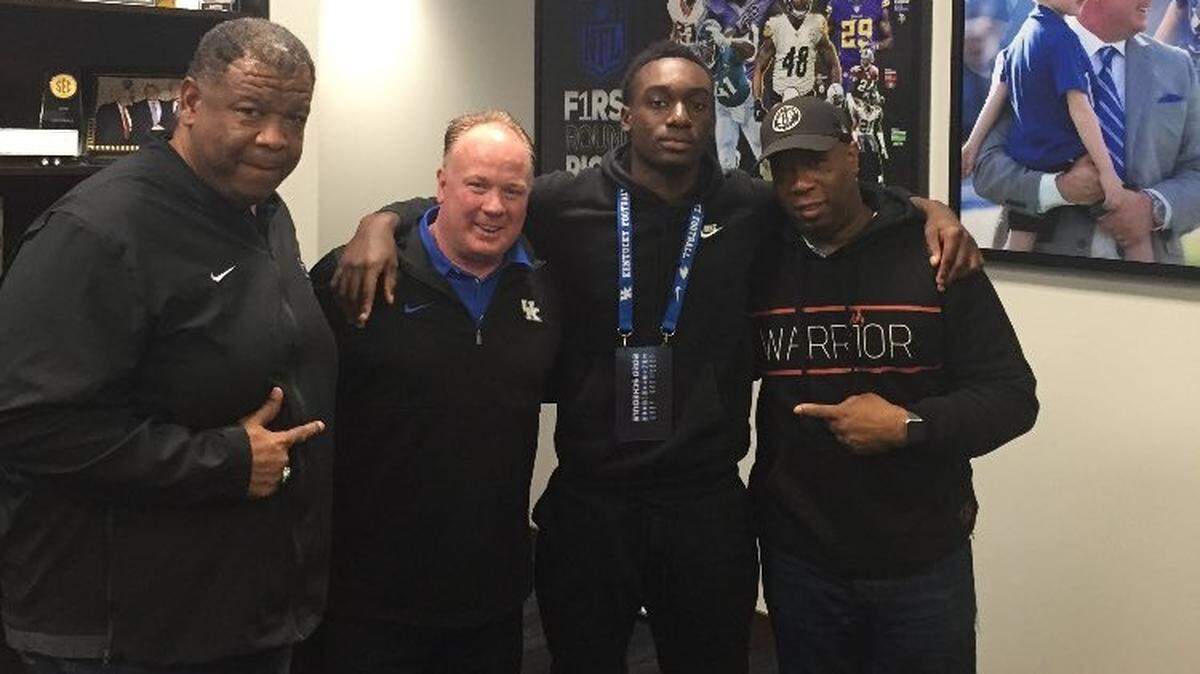 Alex Afari, second from right, committed to Kentucky on Friday.